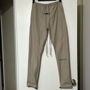 Fear of God Essentials: grey drawstring track pants